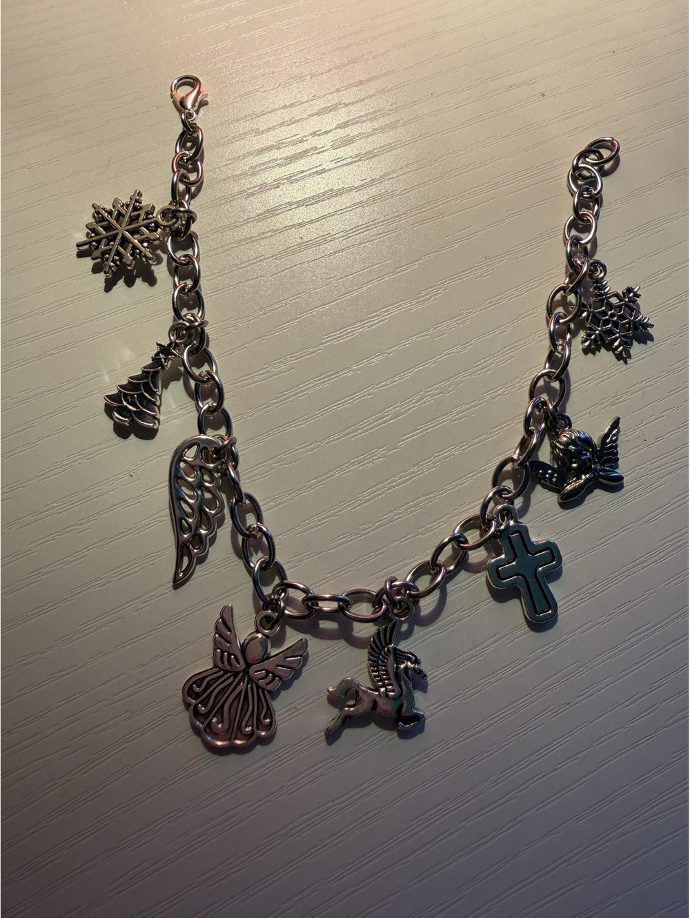 Christmas themed charm bracelet with 8 charms